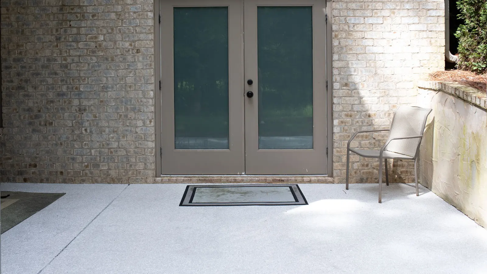 Same patio with a light flake slip-textured coating